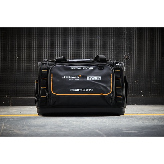 DEWALT ToughSystem 2.0 Black Special Edition tool bag with McLaren branding on a concrete floor.