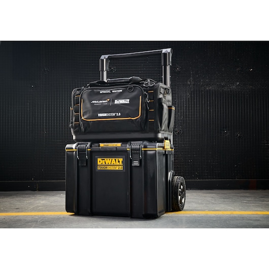 DEWALT ToughSystem 2.0 tool bag and rolling tool box stacked, special edition, black with yellow accents.