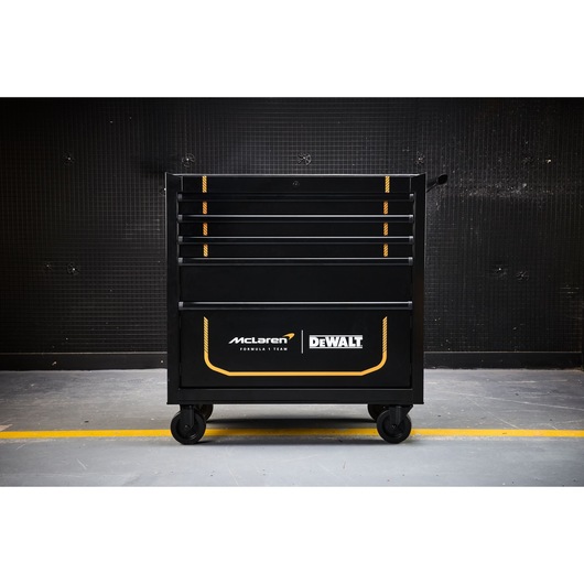 DEWALT McLaren rolling tool chest with multiple drawers for workshop tool organization.
