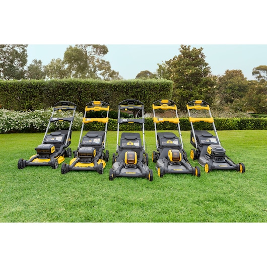 DEWALT lawn mowers on grass. SKUs: DCMWSP660Z2-XE, DCMWSP156W2-XE, DCMWSP550Z1-XE, DCMWP500X1-XE, DCMWP134P2-XE.